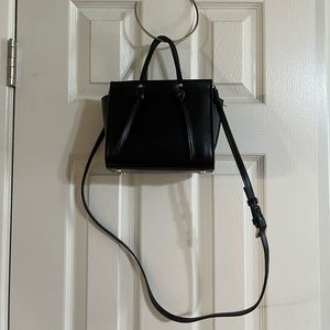 Black mini purse, includes long strap and short strap.